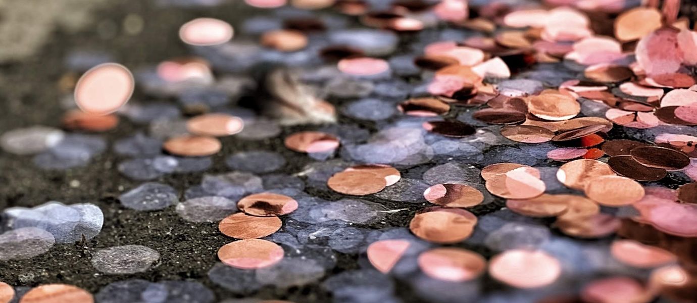 Close-up of copper-colored confetti